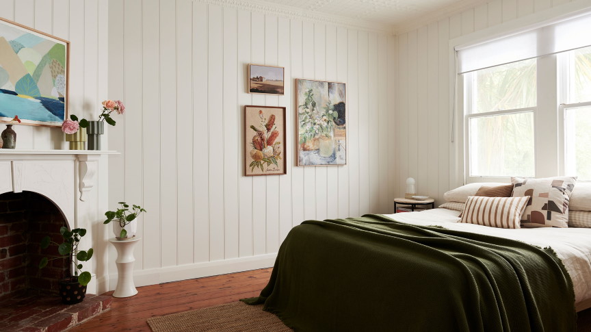 Classic Heritage 150 Surround by Laminex Wall Panels create a visual feature in this master bedroom makeover.